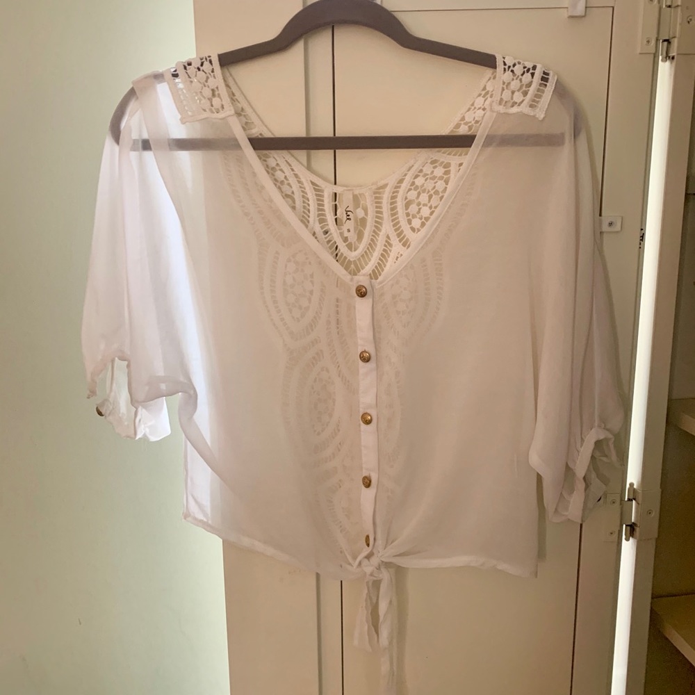 White three quarter sleeve blouse with lace back